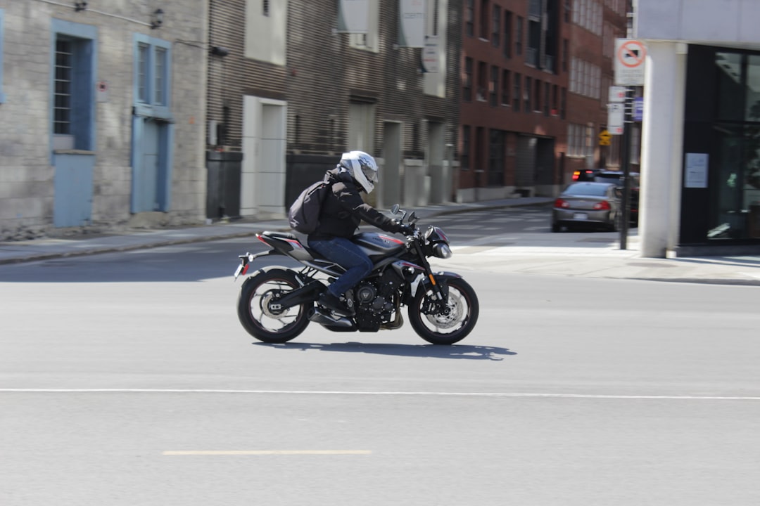 about-02 a-man-riding-a-motorcycle-halbw9l8pjk